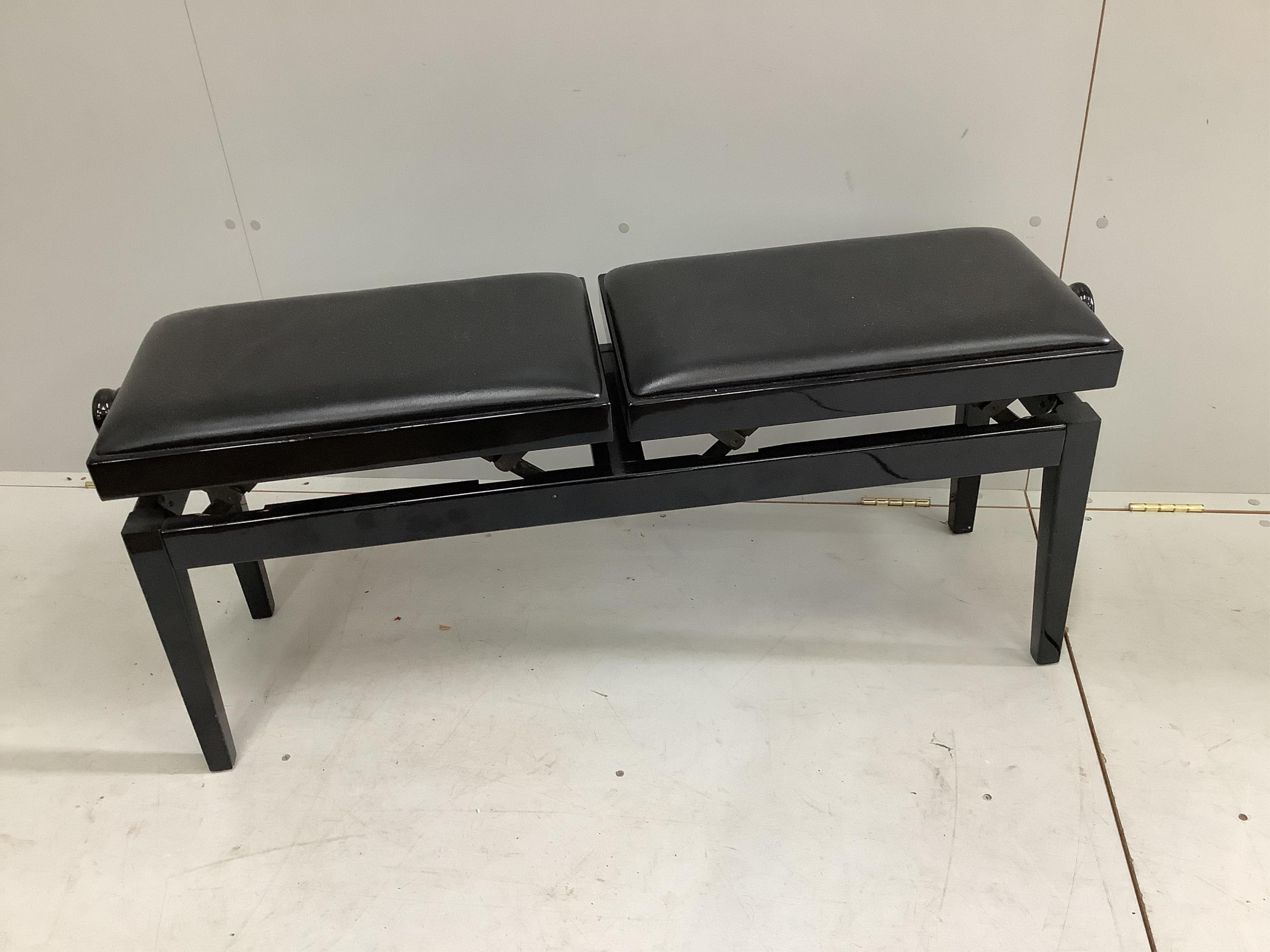 A modern Elysian ebonised baby grand piano, length 160cm, width 148cm, height 101cm, and a duet stool. Condition - good